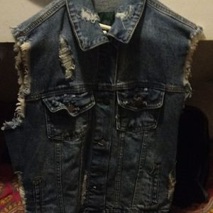 Denim ripped jean jacket.